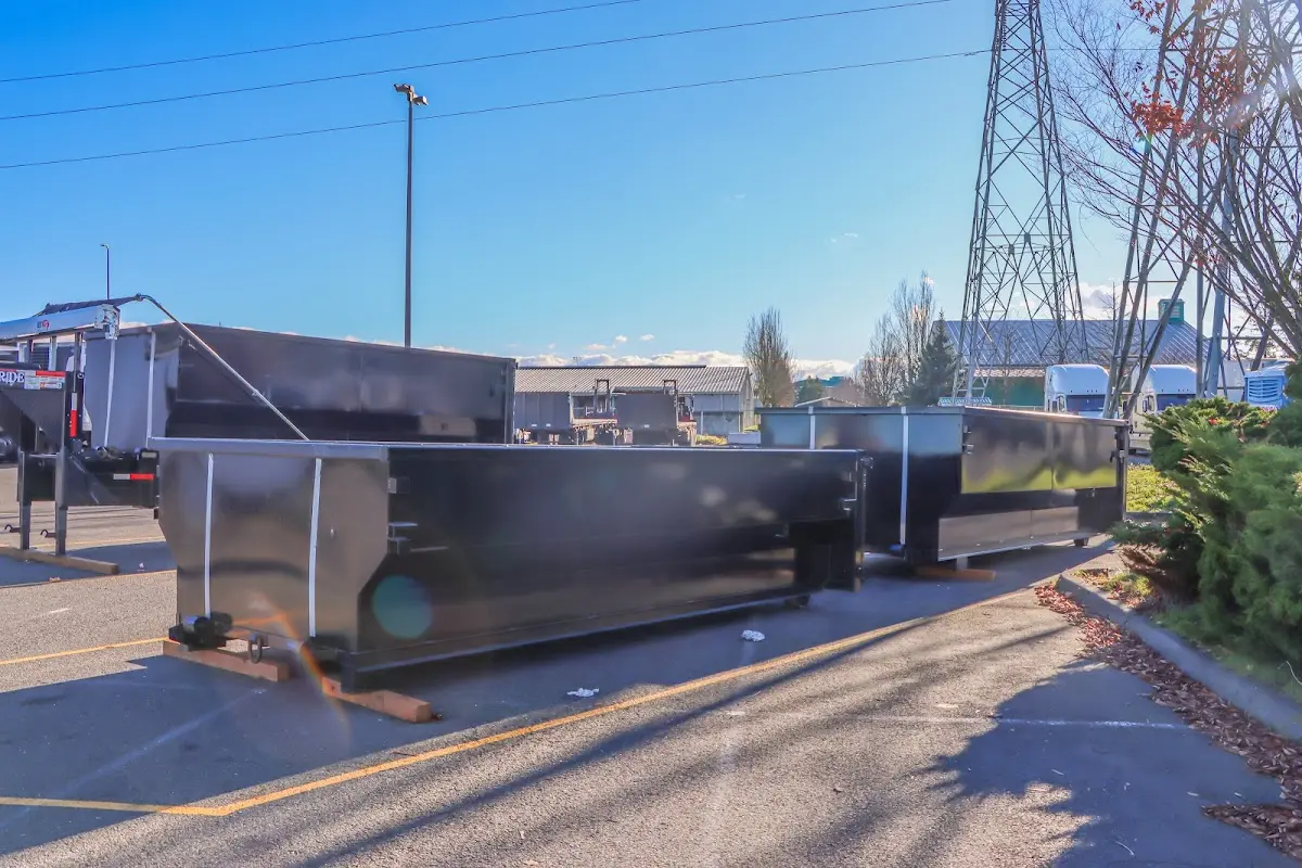 Roll-off dumpster ready for waste disposal at job site for 3 Yard Dumpster Rental in Providence